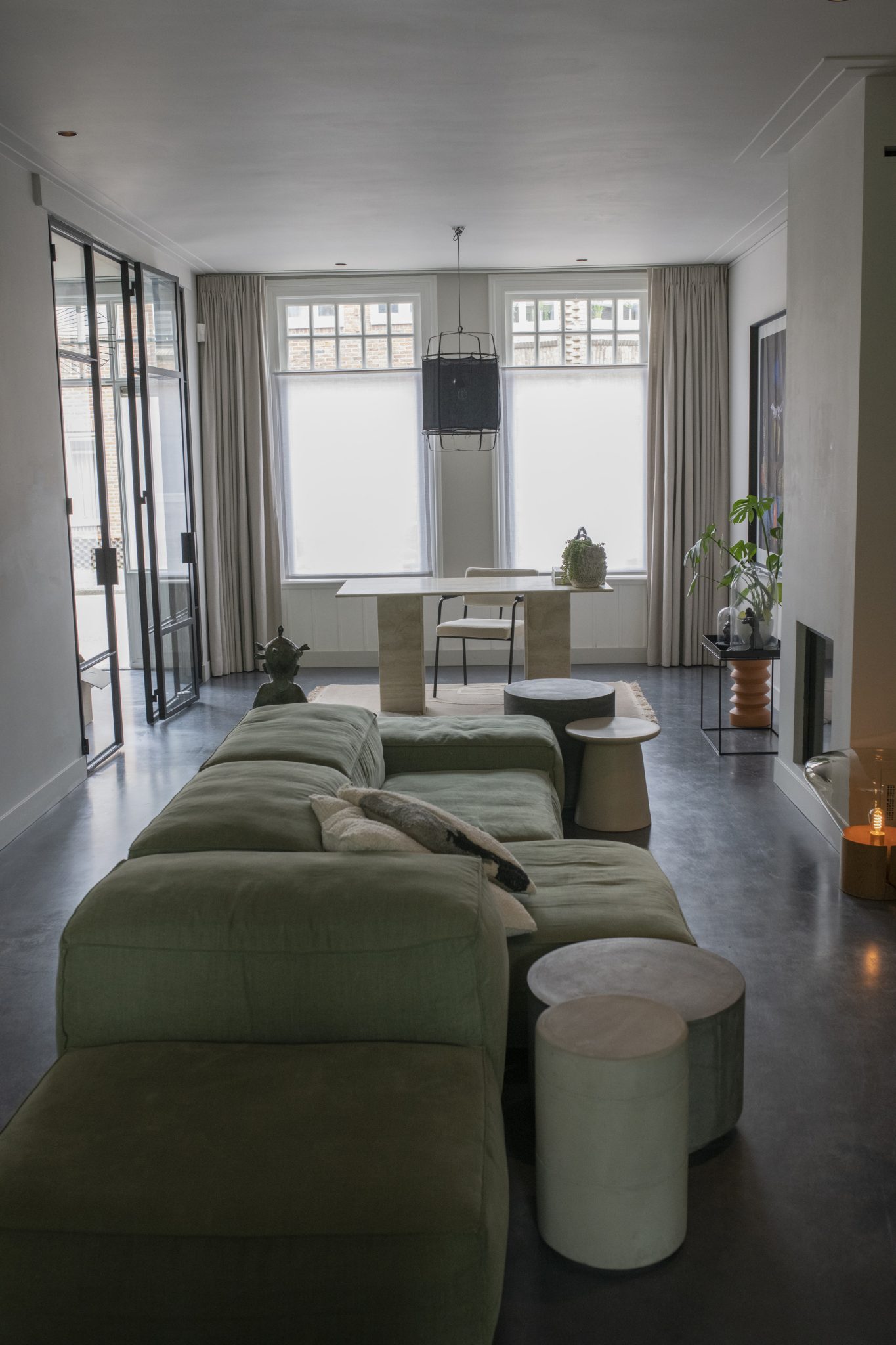 Bedroom with large window, natural light and soft neutral palette